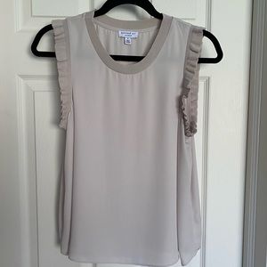 Adorable semi sheer sleeveless top, size S.  Looks cute with white pants/shorts
